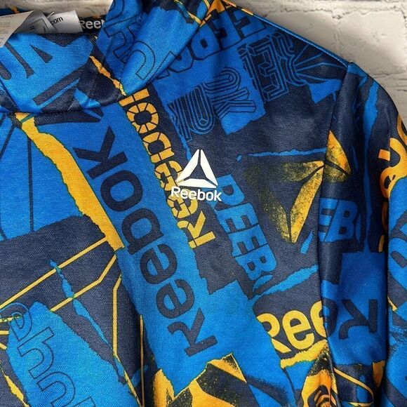 Reebok Boys Blue & Orange All Over Print Hoodie Sweatshirt With Front Pockets L - Picture 2 of 9